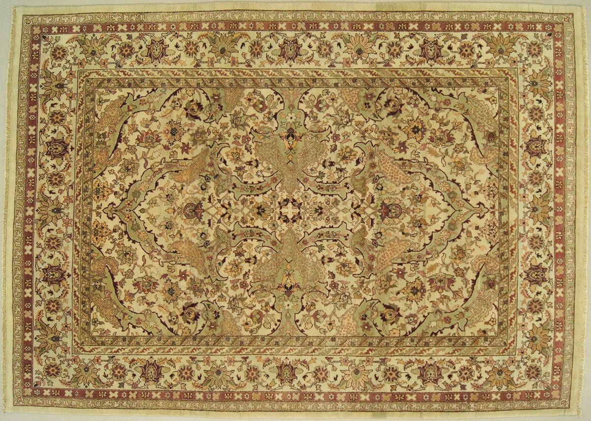 Beige rectangular Oriental rug with floral and geometric patterns