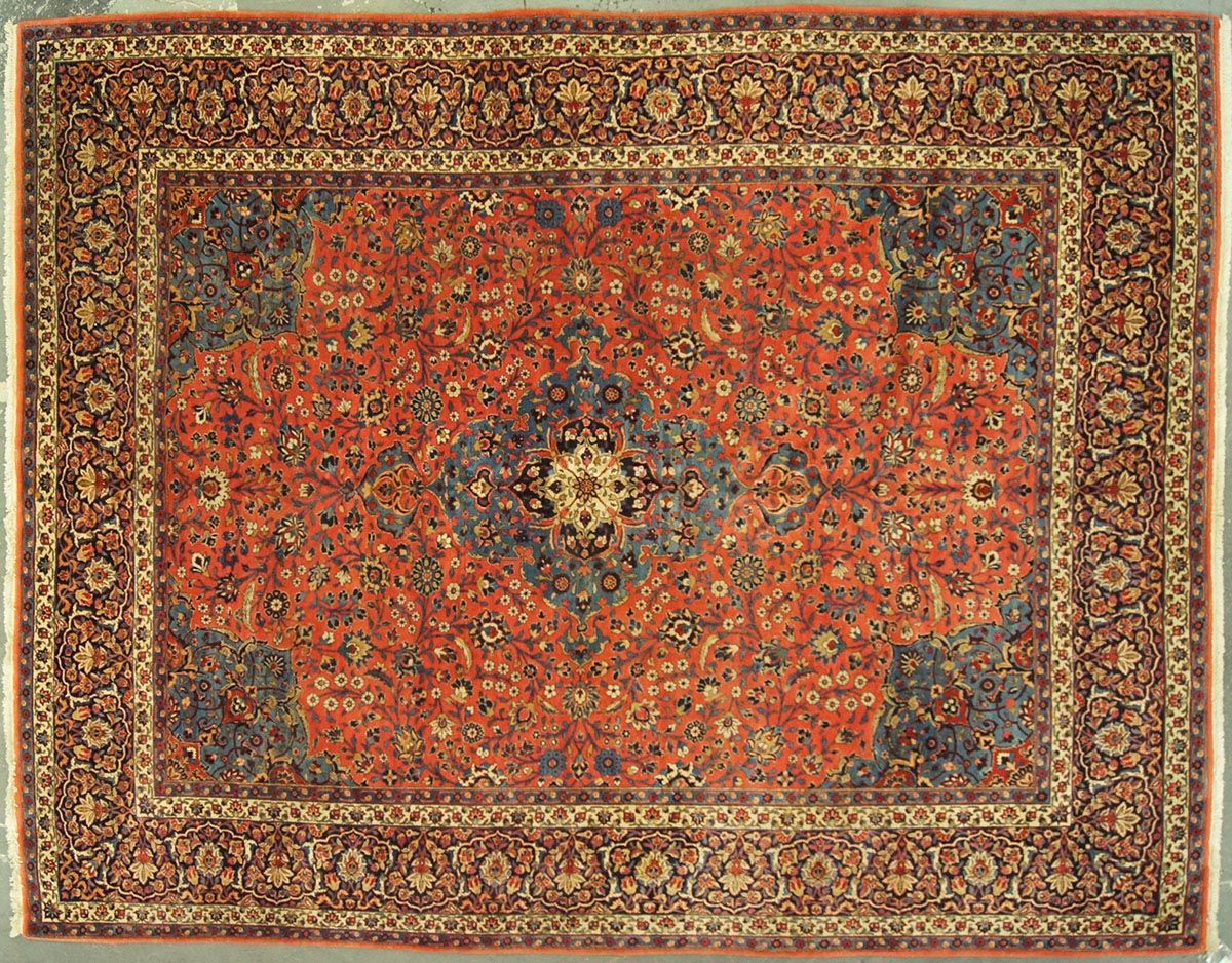 Red and blue Persian rug with floral and geometric patterns
