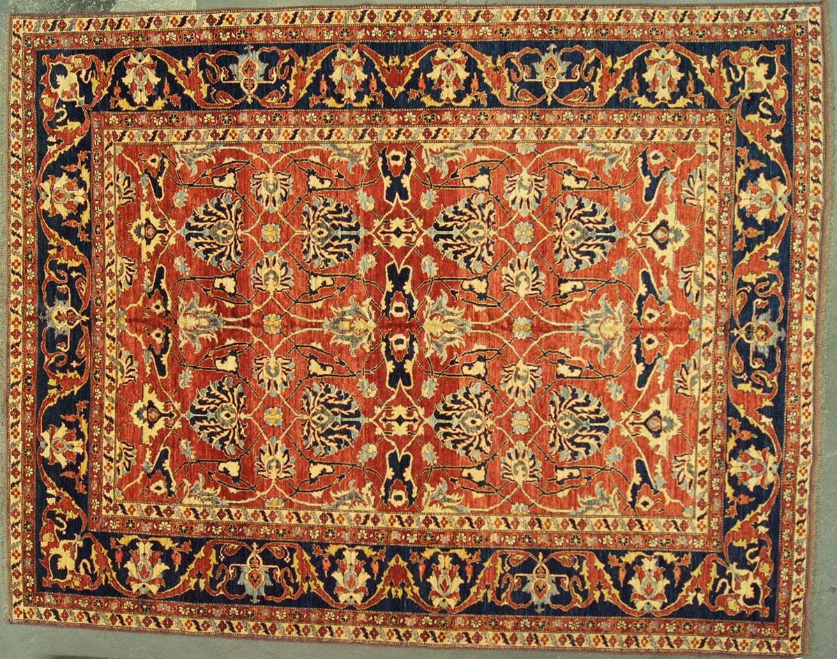 Red and blue patterned Oriental rug