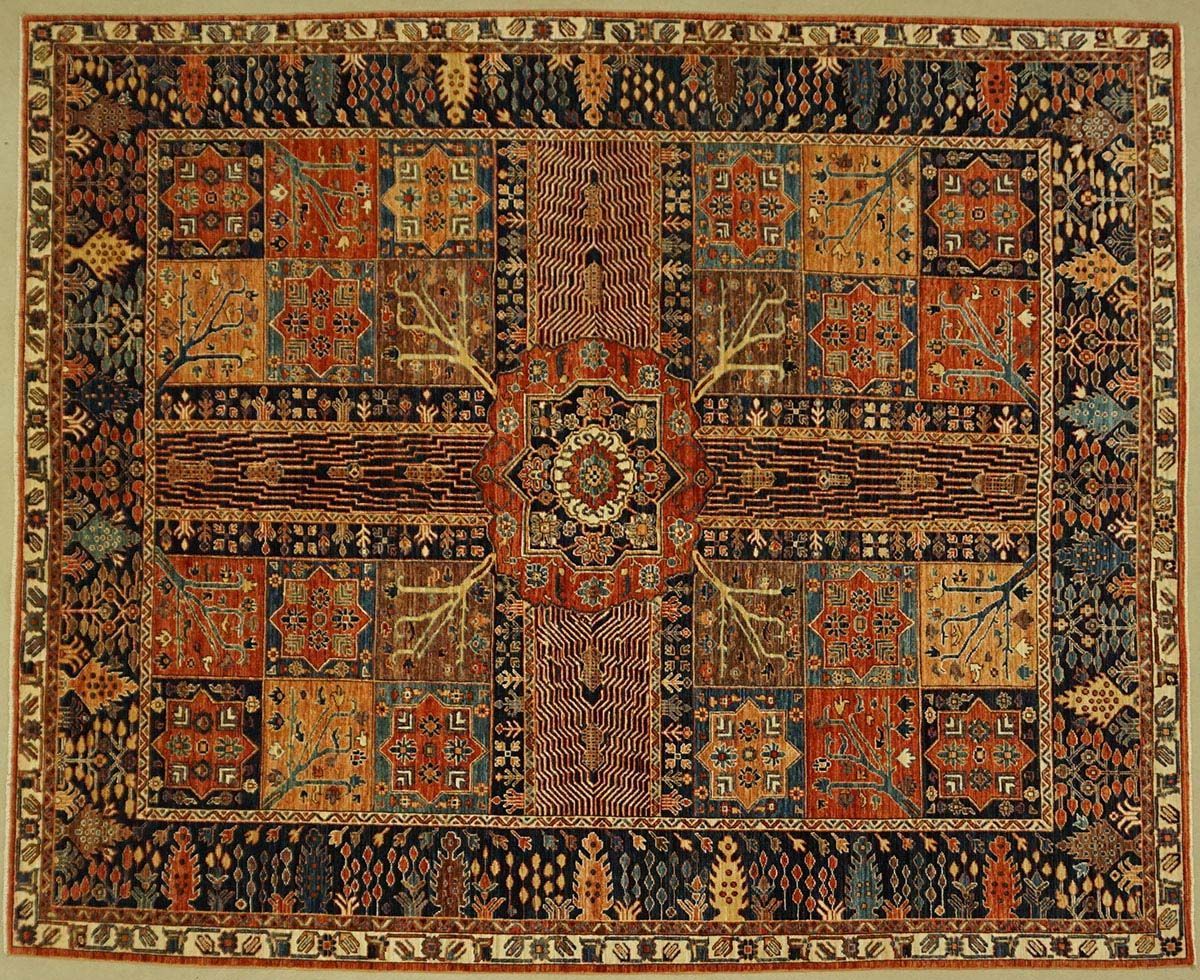 Intricately patterned oriental rug in shades of red, orange, blue, and brown