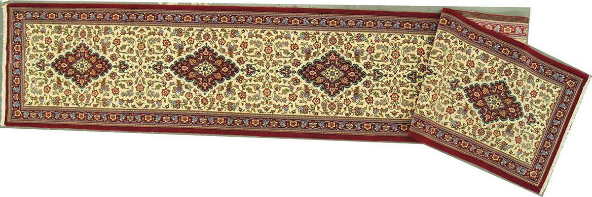 Beige and maroon patterned rug with geometric designs