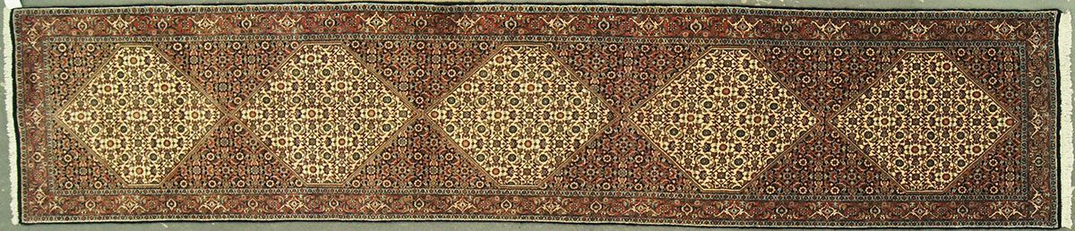 Brown rectangular pattern with four flower-like shapes in a lighter color