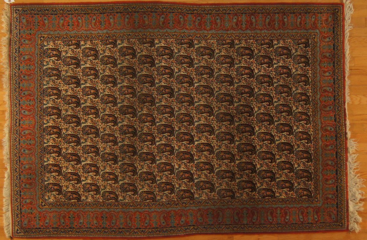 Oriental rug with repeating dark brown motifs on a beige background, bordered by red and brown patterns