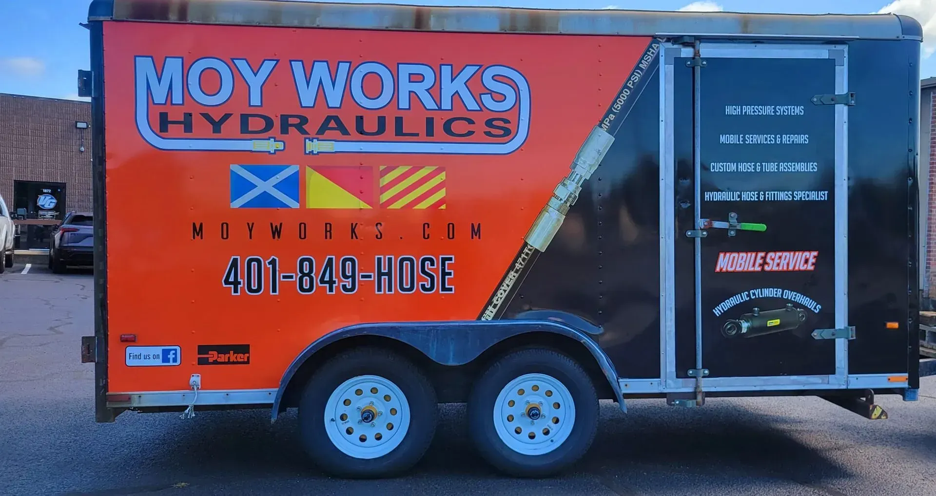 Orange and black trailer with 