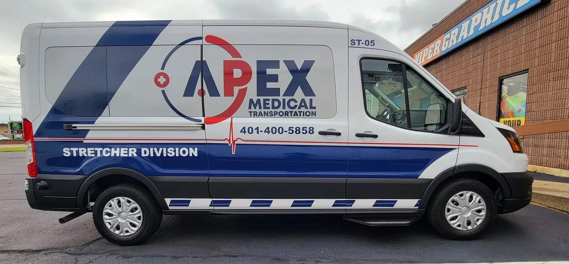 White and blue Apex Medical van; 