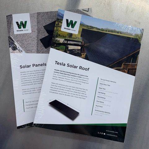 Two brochures on solar products, one for solar panels, the other for Tesla Solar Roof, branded with Woodside Solar.