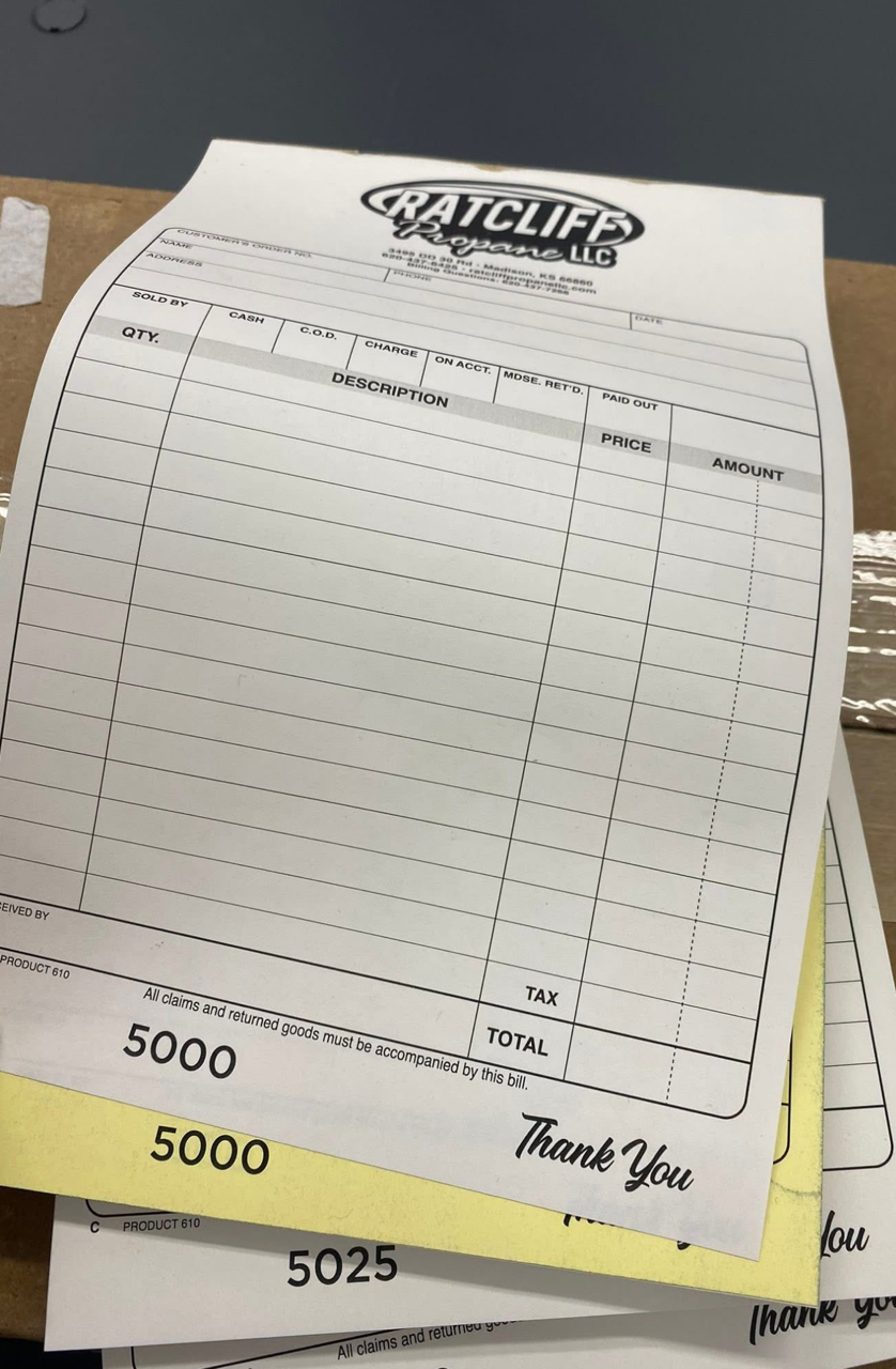 Stack of Watcliff Automotive invoices.