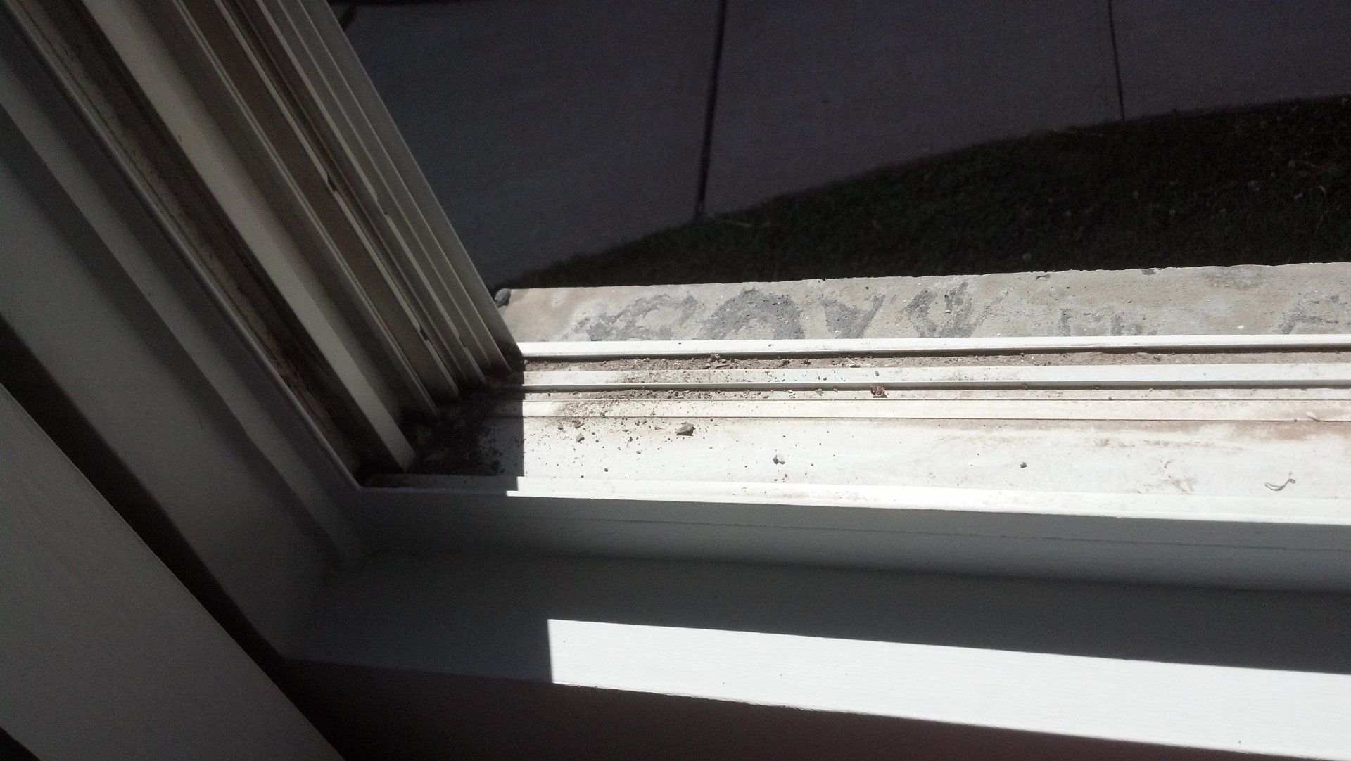 Before window frame cleaning