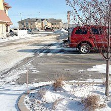 Snowed residential parking lot