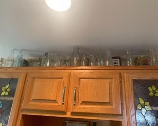 Glass bottels on wooden cabinets