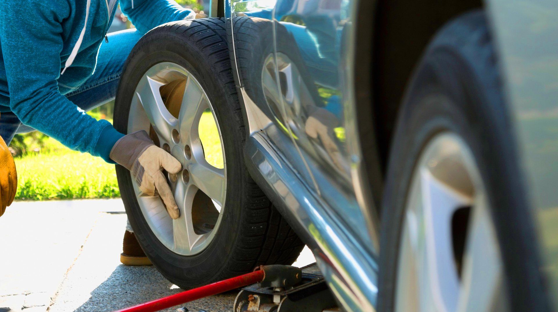 Learn More About Emergency Roadside Assistance Tire change