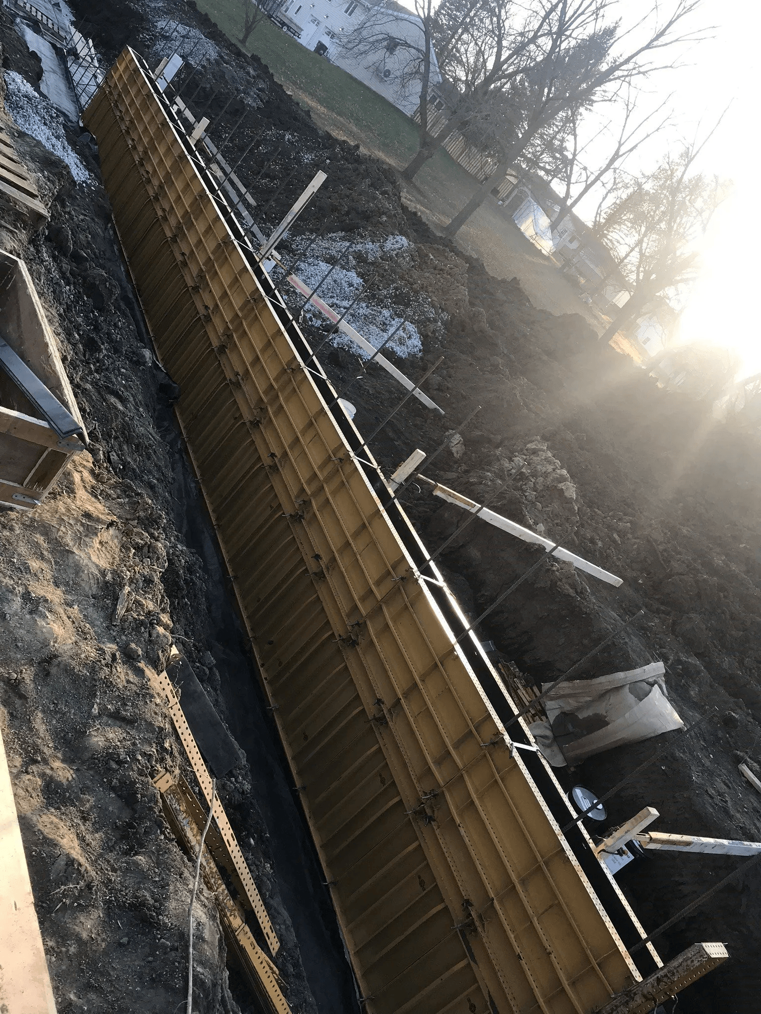 Poured wall construction