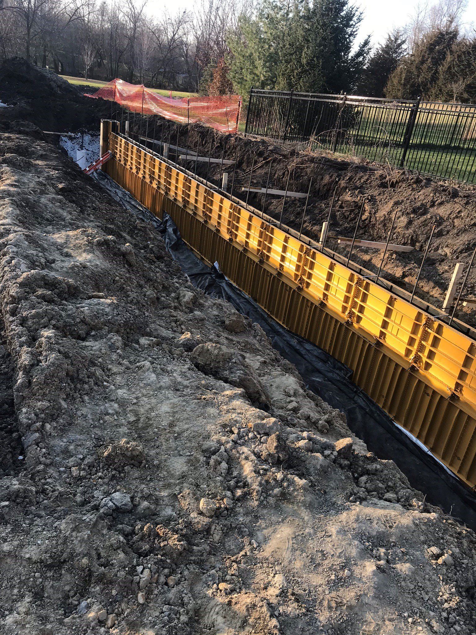 Poured wall construction