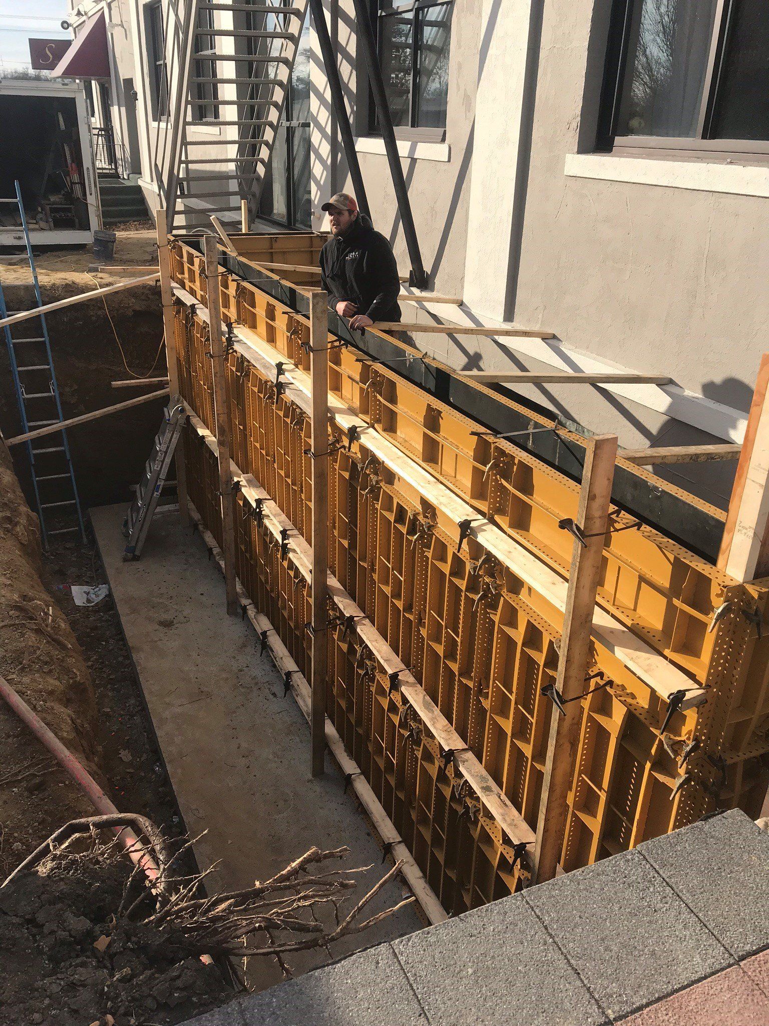 Poured wall construction