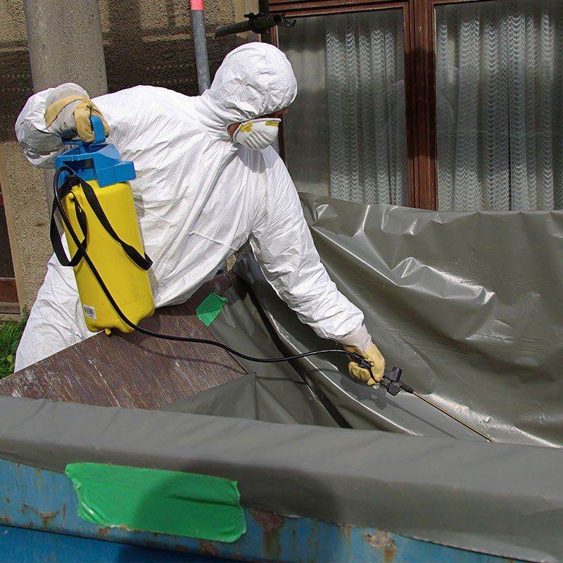 Cleaning asbestos