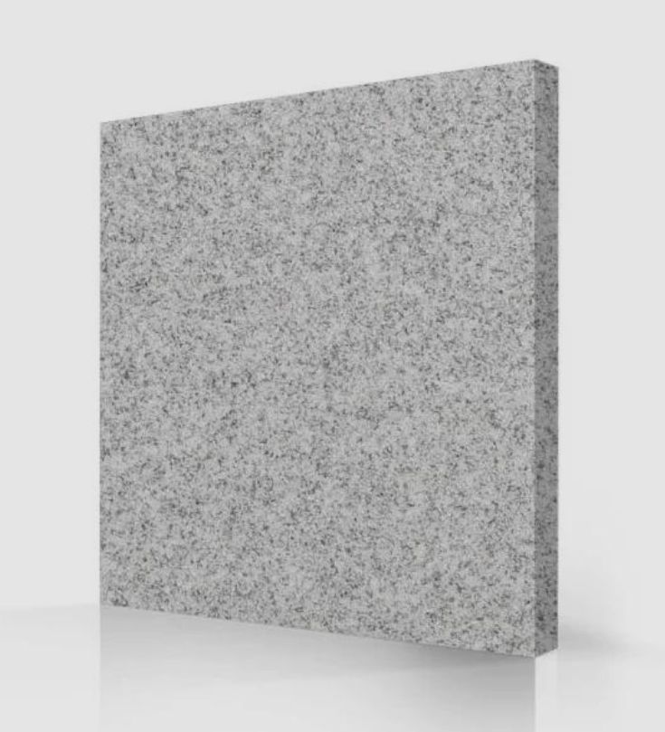 Gray granite tile, square, with a speckled pattern, set against a light background.
