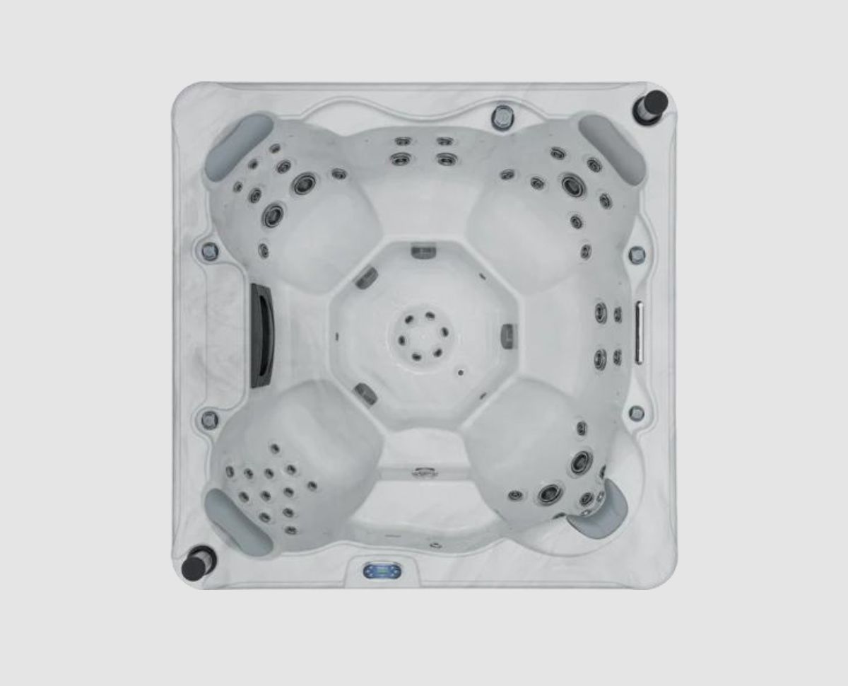 Overhead view of a white, square hot tub with multiple seating areas and jet nozzles.