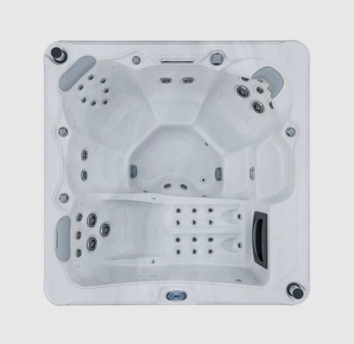 Overhead view of a white hot tub with multiple jet arrangements and seating areas.