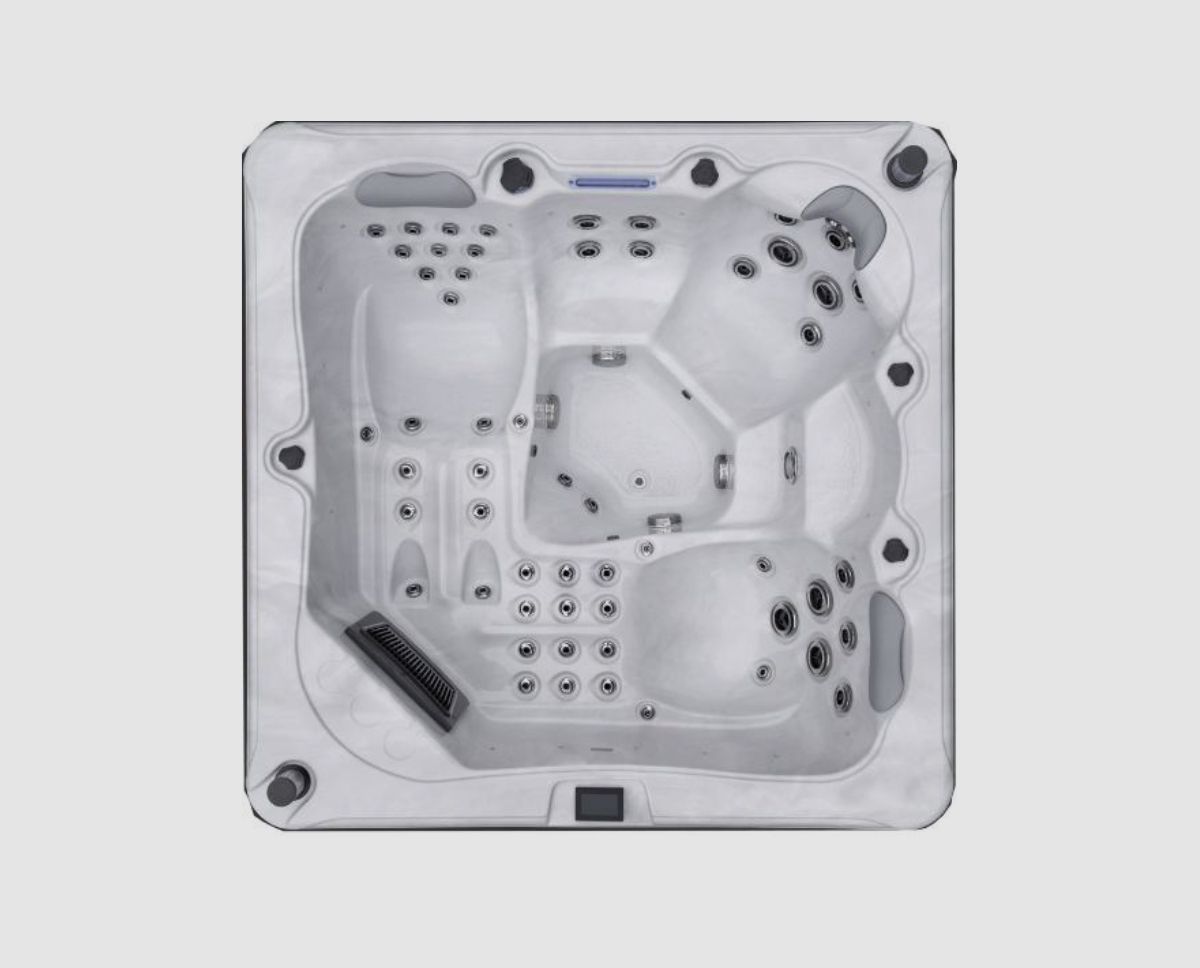 Overhead view of a gray, square hot tub with multiple jet seats and a gray exterior, set on a light gray background.