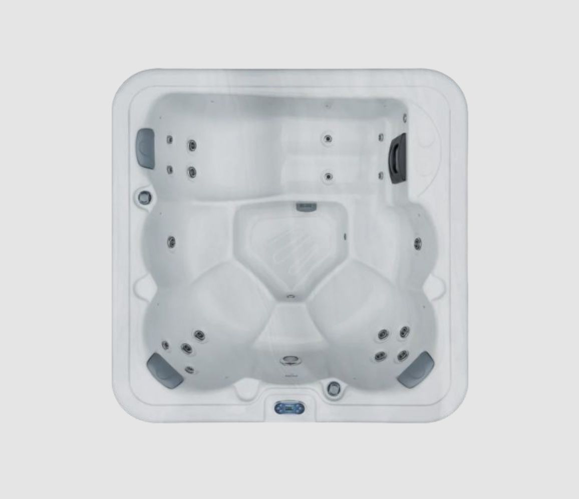 Top-down view of a light gray hot tub. Seats and jets visible. Rectangular shape with rounded edges.