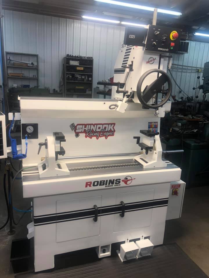 Robins seat and guide machine