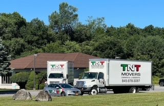 TNT Movers trucks