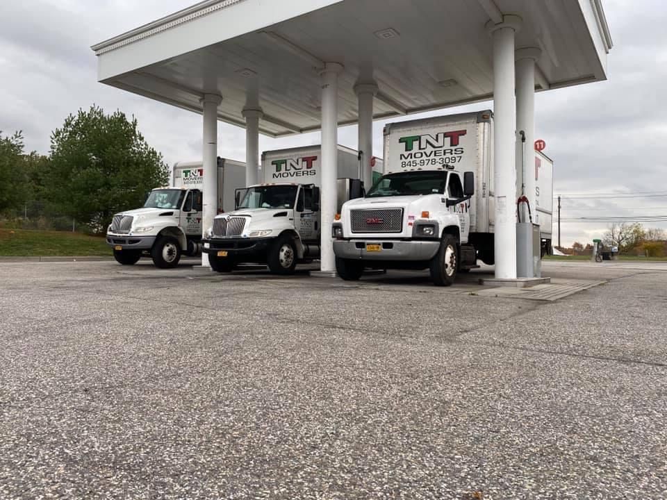 TNT Movers trucks