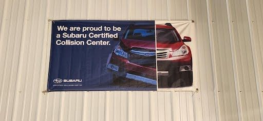 Banner on white wall: 