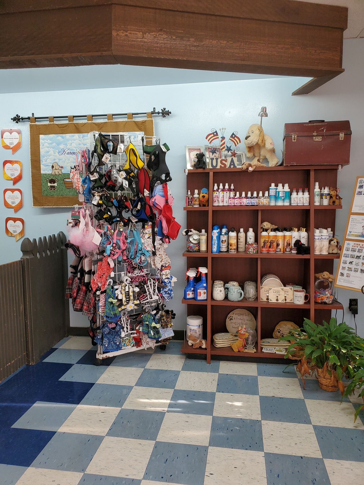 A room with a checkered floor and shelves full of items