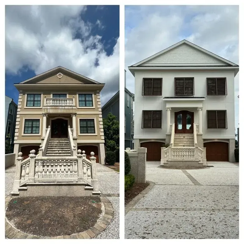 Two adjacent houses, one tan, one white, with staircases, garages, and brown shutters.