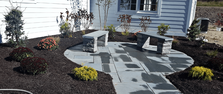 blue stone patio and benches