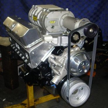 A car engine with a belt attached to it