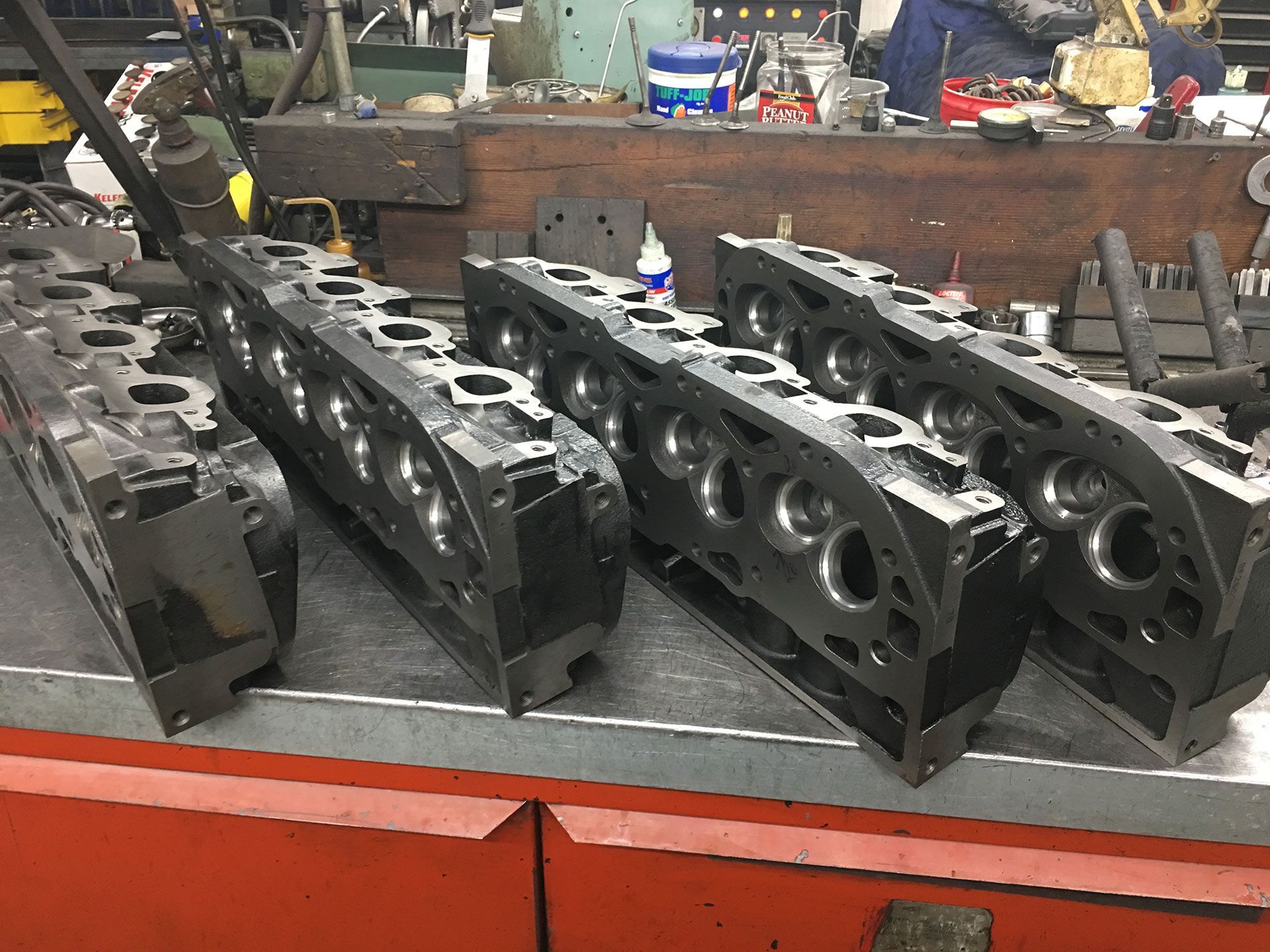 Few engine heads on a table