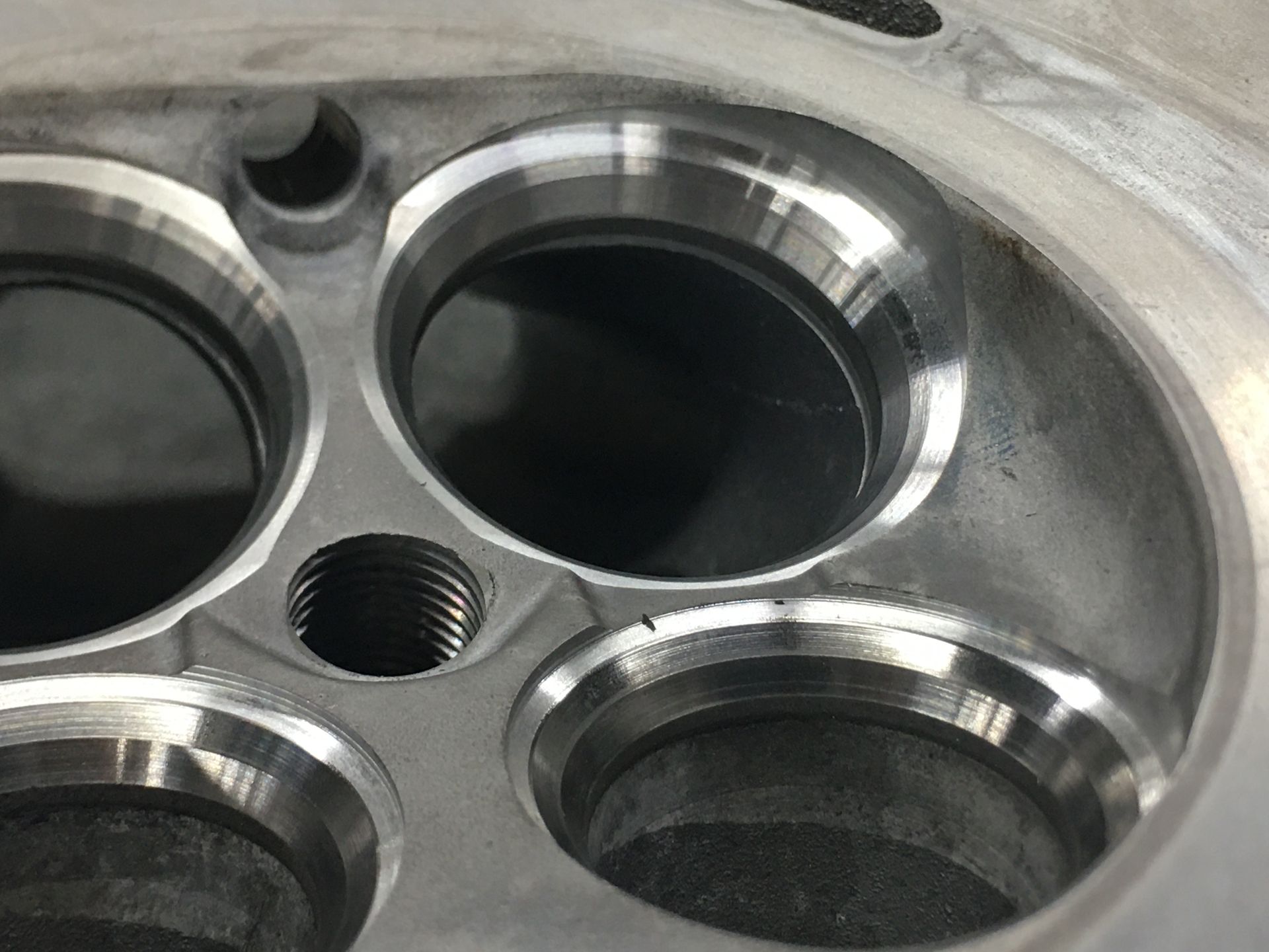 A close up of a metal object with holes in it