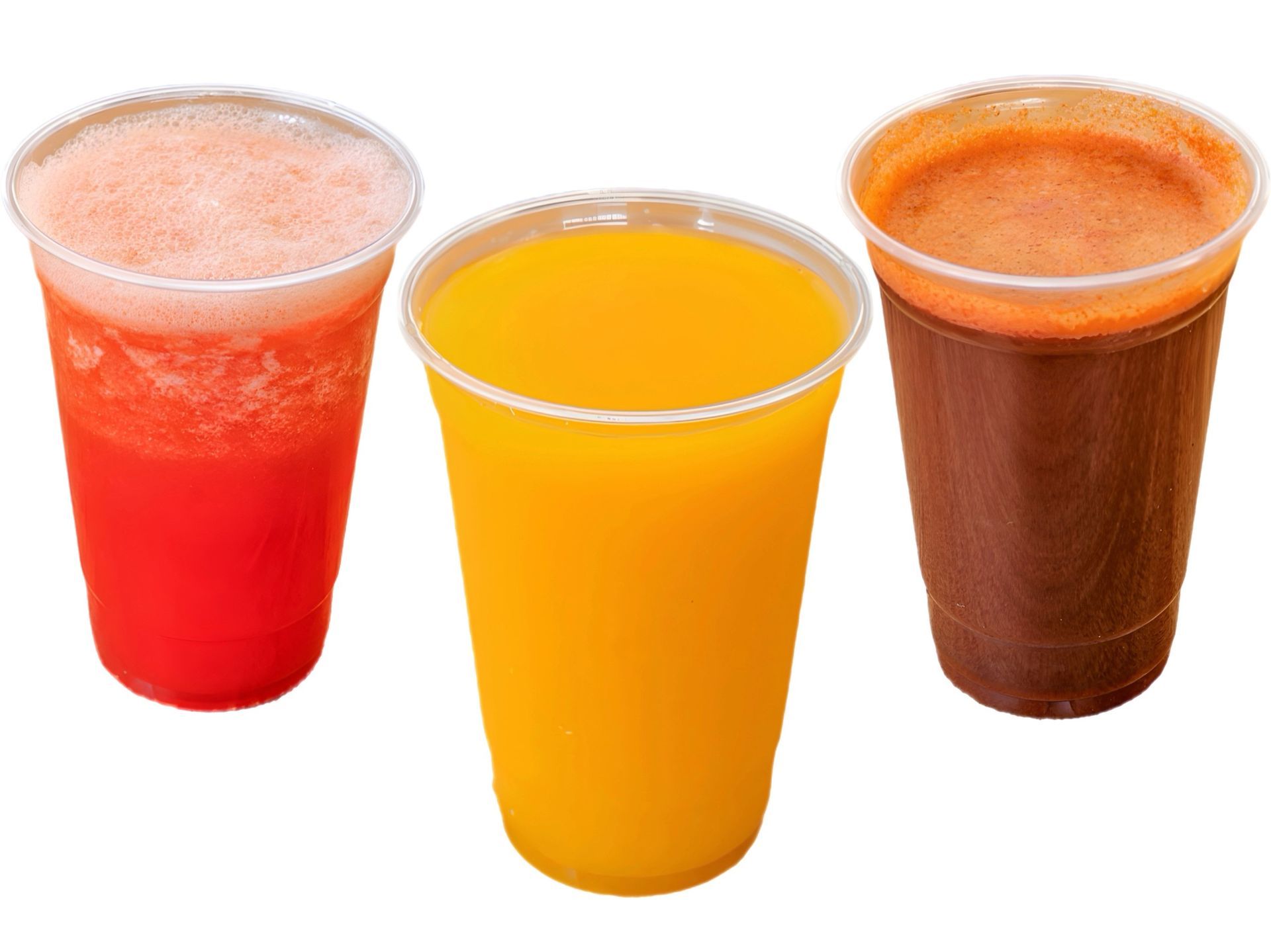 Three cups of different juices on a white background