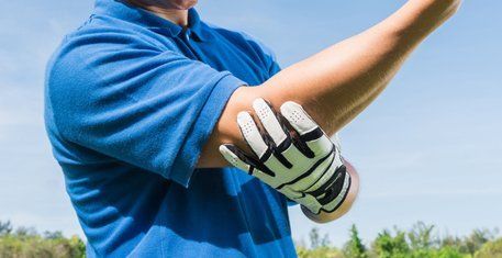 athlete with golfer's elbow