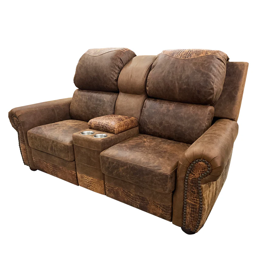 A brown faux leather loveseat recliner featuring a center storage console with two cup holders and decorative nailheads.