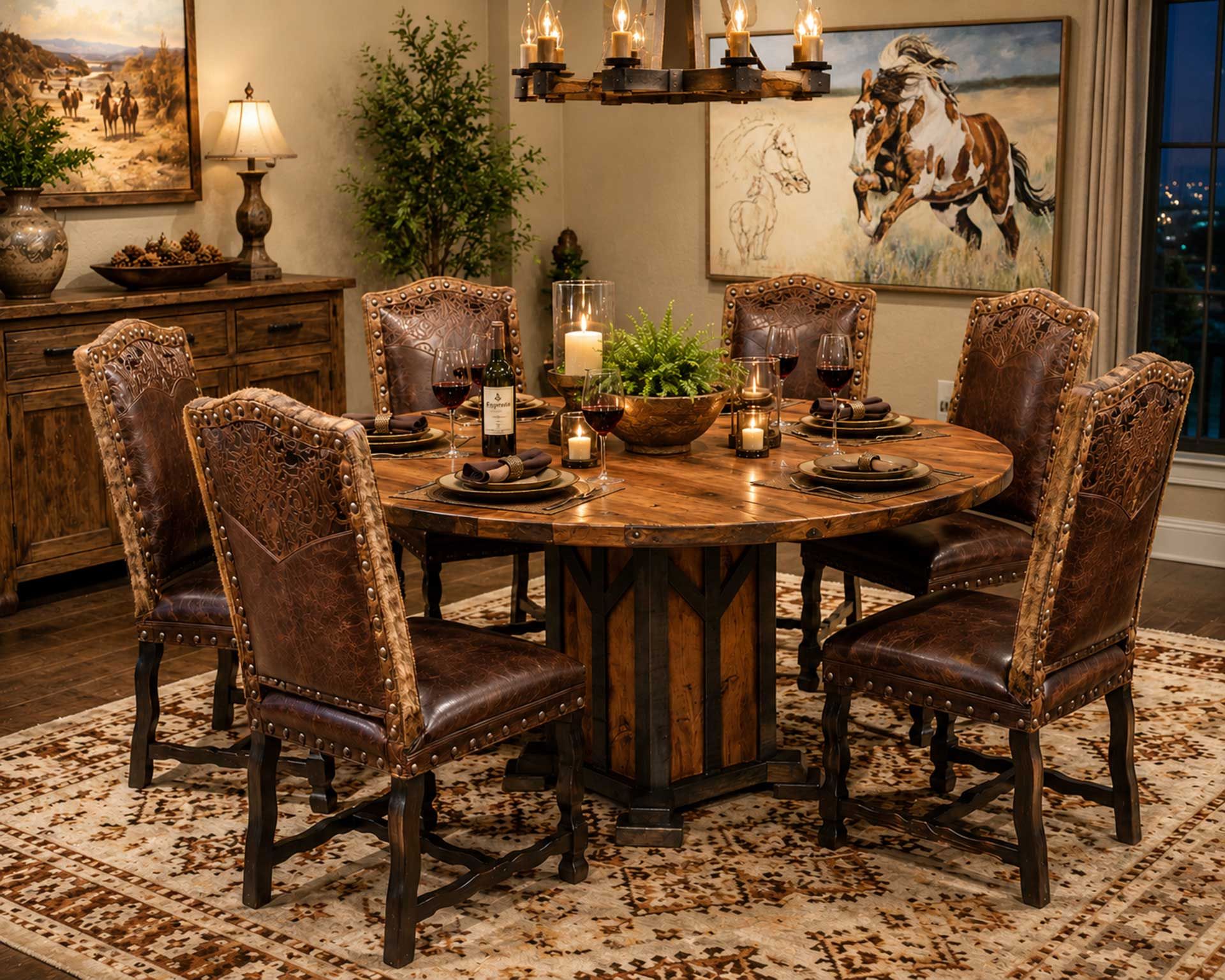 Rustic dining room with a round wooden table, upholstered chairs, and horse artwork on the walls.