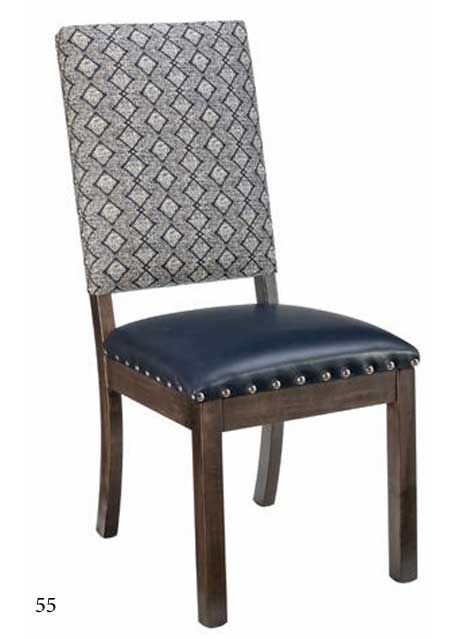 Wooden dining chair with patterned back and dark upholstered seat