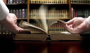 lawyer browsing a book