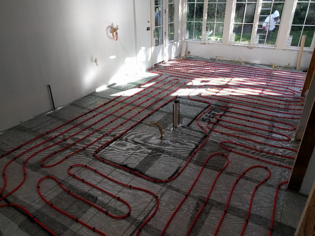 A fireplace with a brick wall and a candle in it