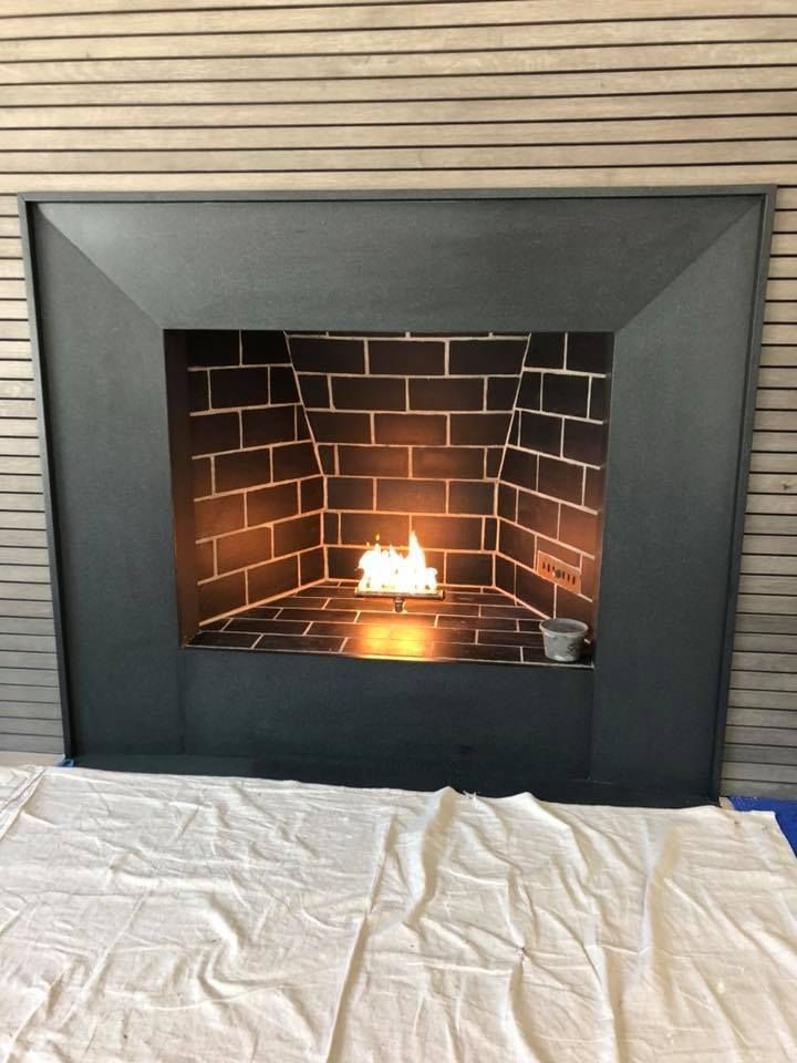 A room with a lot of red pipes on the floor