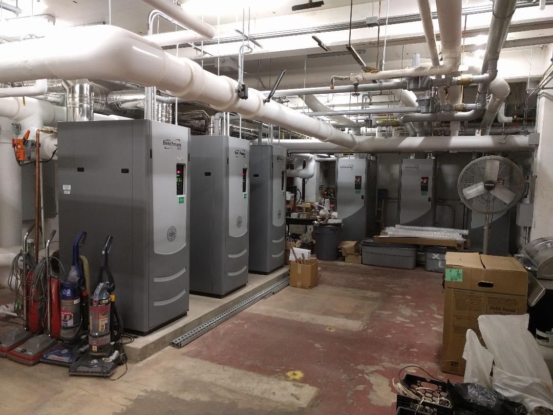 A wooden floor with a grid of squares on it