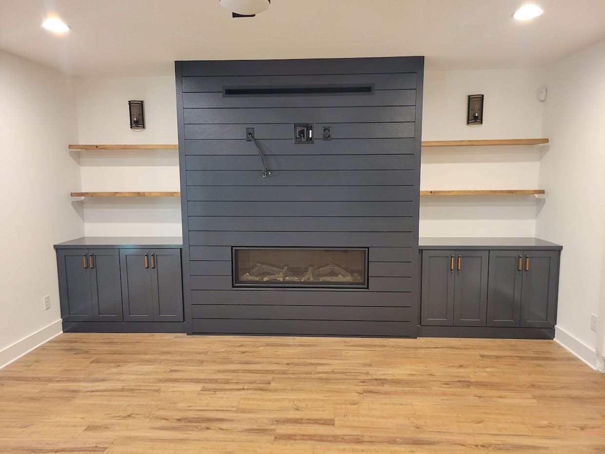 Fireplace surrounded by cabinets