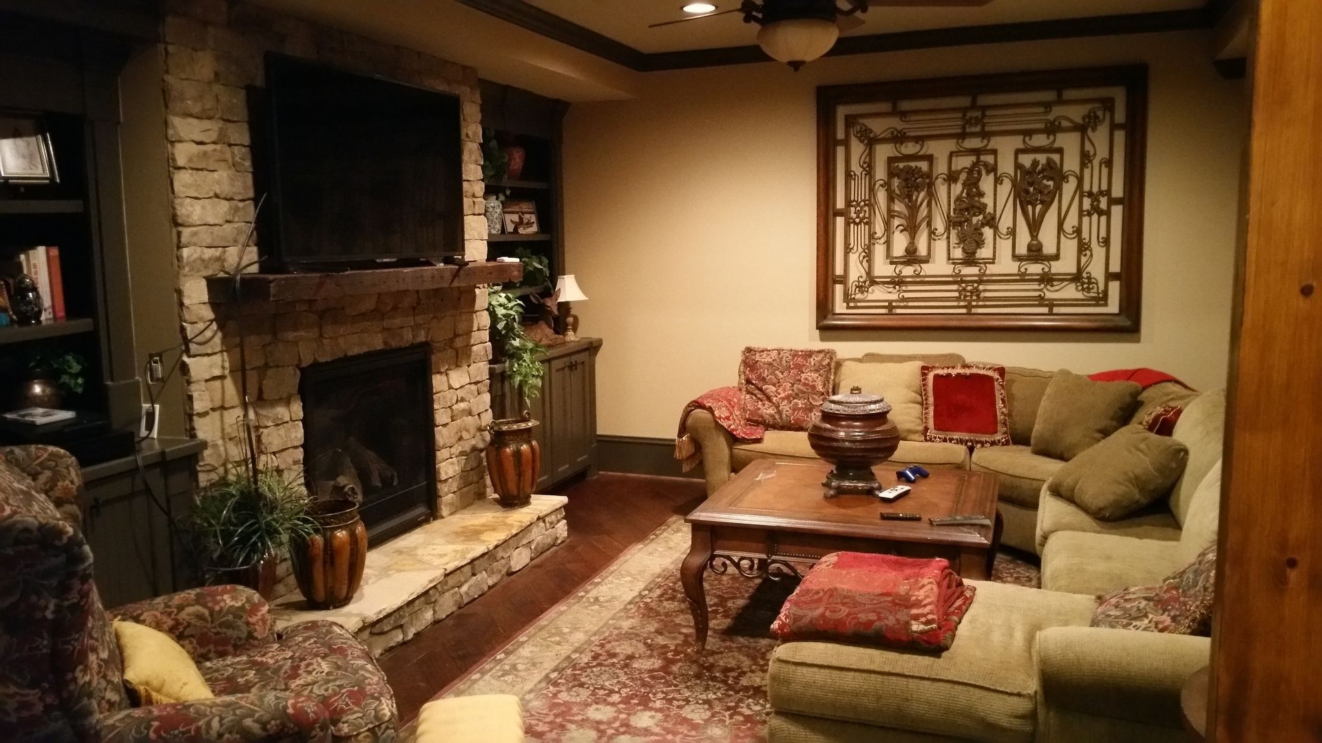 a living room filled with furniture and a fireplace