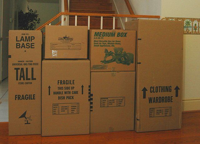 Moving boxes placed inside the house