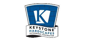 Logo for Keystone Hardscapes: blue shield with white