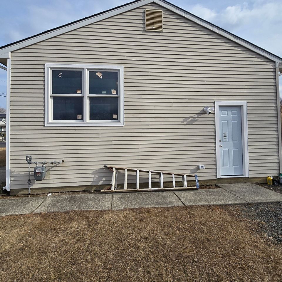 A house with a ladder in front of it