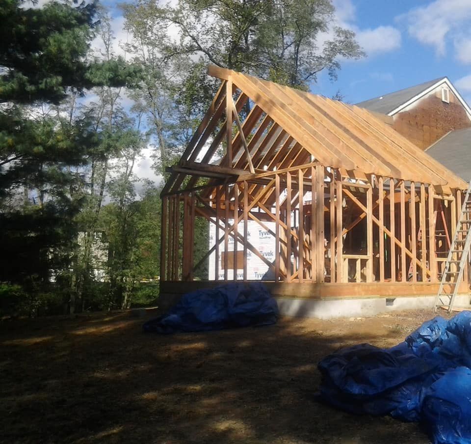 A house that is being built with a wooden frame