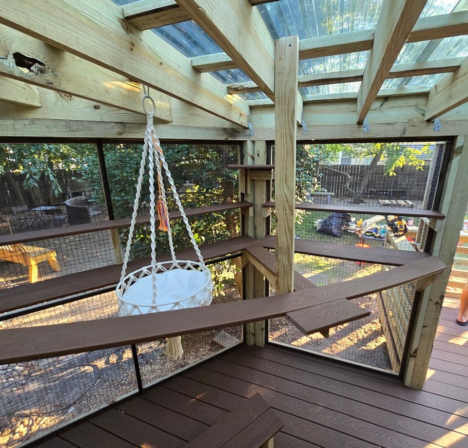 A hanging basket is hanging from the ceiling of a room